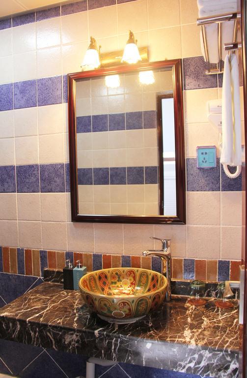 Raimi Hotel Chaqiyu Bilik gambar