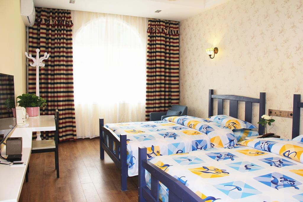 Raimi Hotel Chaqiyu Bilik gambar