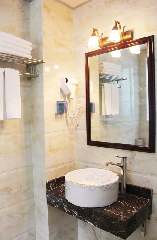 Raimi Hotel Chaqiyu Bilik gambar