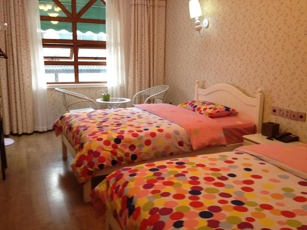 Raimi Hotel Chaqiyu Bilik gambar